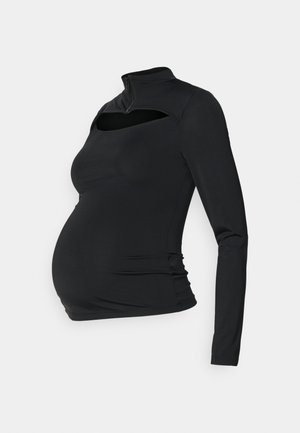 Czarny, długa rękawów top ciążowy z zamkiem błyskawicznym przy kołnierzu i wycięciem na klatce piersiowej, wykonany z miękkiego, elastycznego materiału, dopasowany w talii.