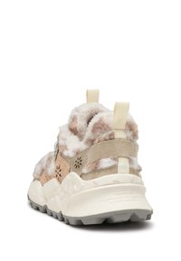 Fuzzy beige and cream sneaker with textured surface, textured suede accents, and a thick white midsole. Features a pull tab at the back.