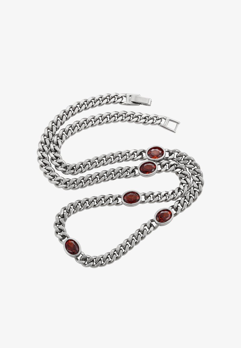 Bracciale in argento con tre gemme rosse ovali, collegato da spesse maglie di metallo lucido e chiuso con un gancio.