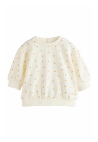 Maglione chiaro in crema con maniche a sbuffo corte, motivo floreale in arancione e verde, polsini e orlo a coste, con un'etichetta che dice "FELICE."