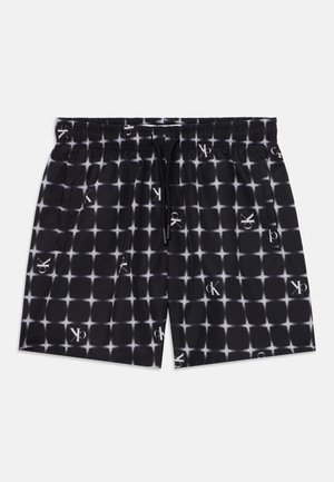 Pantaloni da bagno neri con un motivo a quadri, caratterizzati da accenti logo bianchi, vita elasticizzata e cordino per la regolazione. Materiale leggero.
