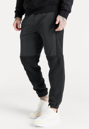 HYBRID PRO ELASTIC CUFF PANTS - Pantaloni sportivi - black