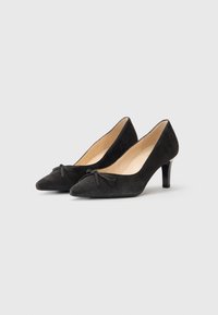 Chaussures à talons hauts en suede noir avec un bout pointu, ornées d'un nœud décoratif à l'avant et d'un talon fin. Doublure intérieure lisse.