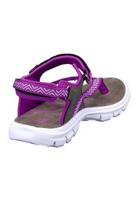 Purple sandal with patterned straps, cushioned insole, and white rubber sole. Features adjustable straps and a back heel support.