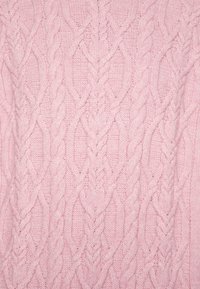 Light pink cable-knit sweater featuring textured patterns and raised braids. Made from soft, chunky yarn, displaying a cozy design.