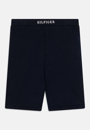 Pantalones cortos de algodón azul marino con cintura elástica que presenta el logo "HILFIGER" en blanco. Textura suave, diseño hasta la rodilla, sin bolsillos.