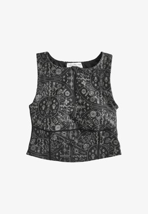 Crna majica bez rukava s uskim krojem, koja ima srebrni astološki uzorak, okruglu izrez i skriveno zatvaranje na munju sprijeda.