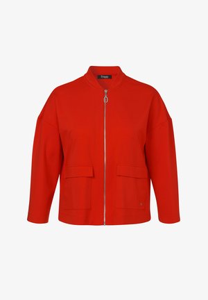 Bright red zip-up jacket with two large front flap pockets and a round collar, designed with long sleeves and a relaxed fit.