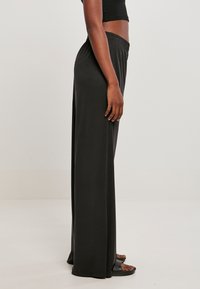 Urban Classics LADIES MODAL WIDE LEG PANTS - Trousers - black