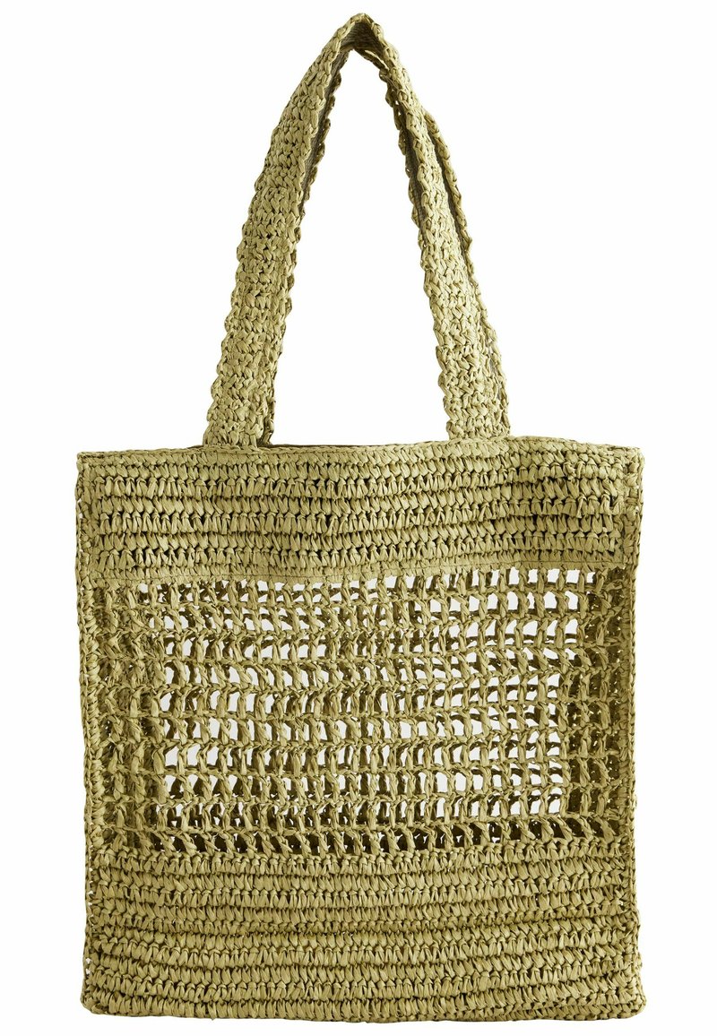 Borsa tote in paglia intrecciata di colore verde chiaro, caratterizzata da un design aperto e testurizzato con manici robusti per un facile trasporto.