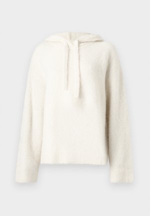 Hoodie bianco e fluffy realizzato in morbido materiale, con cappuccio regolabile, maniche larghe e dettagli a coste sull'orlo. Aspetto accogliente e testurizzato.