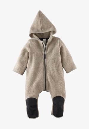 Beige Wolle-Einteiliger Anzug mit spitzem Kapuzendesign, Reißverschluss und schwarzen Kniebesätzen, ausgestattet mit langen Ärmeln und einer strukturierten Oberfläche.