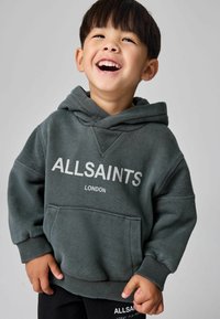 Felpa grigia in cotone con tasca frontale, caratterizzata da un grande logo bianco "ALLSAINTS" e dal piccolo testo "LONDON", dettagliata con un ampio cappuccio e polsini a costine.