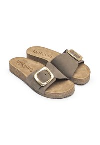Brown suede sandals with a cork footbed, featuring two wide straps and metallic square buckles for adjustable fit.