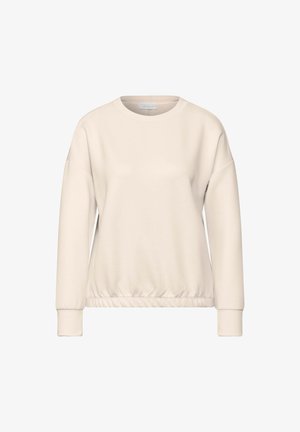 Felpa di un beige chiaro con scollatura a girocollo, spalle abbassate e vita elasticizzata. Realizzata in un morbido tessuto testurizzato con maniche lunghe.