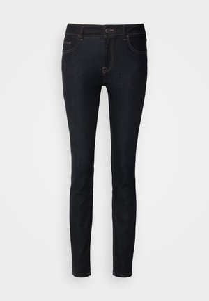 Schwarze Skinny-Jeans aus Denim mit Kontrastnähten, mittelhoher Taille, Fünf-Taschen-Design und glatter Textur.