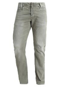 Jean en denim gris avec une coupe slim, présentant un design classique à cinq poches et des détails de couture subtils. Texture douce avec une légère extensibilité.