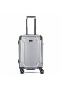 Zilveren harde handbagagekoffer met een getextureerd oppervlak, dubbele wielen en een uitschuifbare handgreep. Opvallende ontwerp lijnen op de behuizing.