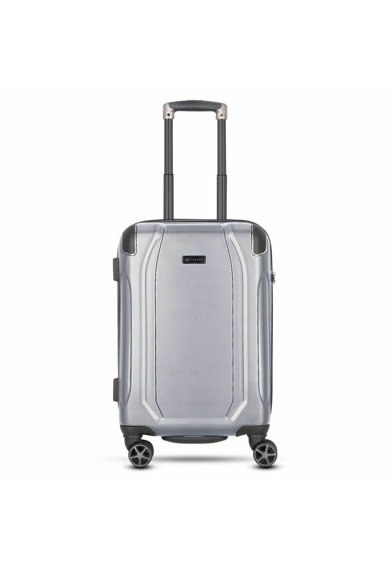 Zilveren harde handbagagekoffer met een getextureerd oppervlak, dubbele wielen en een uitschuifbare handgreep. Opvallende ontwerp lijnen op de behuizing.