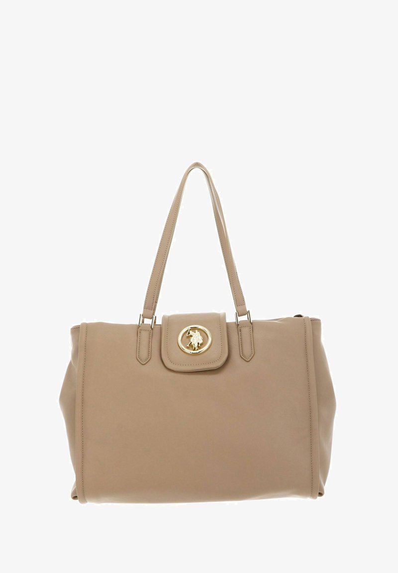 Sac à main en cuir beige à texture lisse, avec deux bandoulières, un médaillon logo doré sur le devant, et une fermeture à rabat.