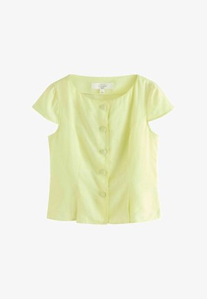 Blouse en lin jaune clair à manches courtes avec encolure ronde et cinq boutons recouverts de tissu à l'avant.