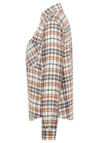 Plaid flannel shirt in white, orange, and black. Features a button-down collar and single chest pocket. Soft, textured fabric.