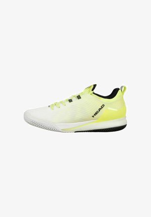 Scarpa atletica bianca e gialla brillante con tomaia texturizzata, accenti neri e suola con motivo. Presenta un colletto imbottito e un tallone rinforzato.