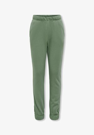 Groene joggerbroeken van zacht materiaal, met een elastische tailleband, zijzakken en elastische boorden bij de enkels.