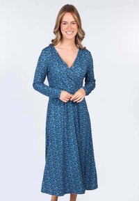 Langärmliges Wickelkleid aus blauer Stoff mit floralem Muster. Mit V-Ausschnitt und fließender Silhouette, die bis zur Mitte der Wade reicht.