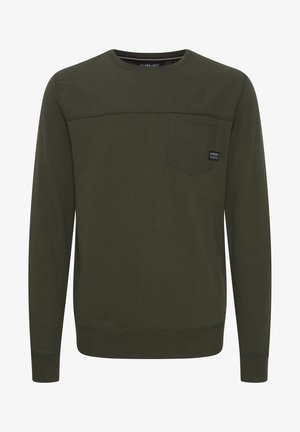 Olīvu zaļš garo piedurkņu krekls no mīksta auduma, ar frontālu kabatu un ribotām aprocēm. Vienkāršs un plūstošs dizains.