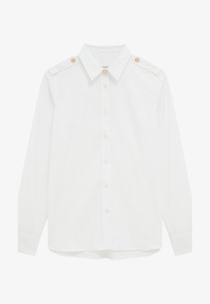 Chemise blanche à manches longues en coton avec un col boutonné, dotée de boutons aux épaules et d'un ourlet droit. Texture lisse.