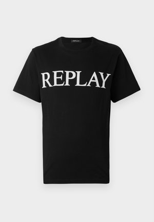 Black cotton t-shirt featuring a large white "REPLAY" print on the front. Classic crew neck design with short sleeves.