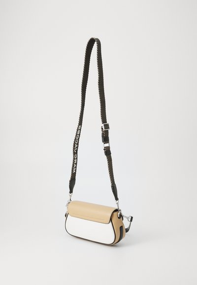 Shoulder bag with a tan and white color-block design, featuring a smooth leather finish and a woven adjustable strap with logo accents.