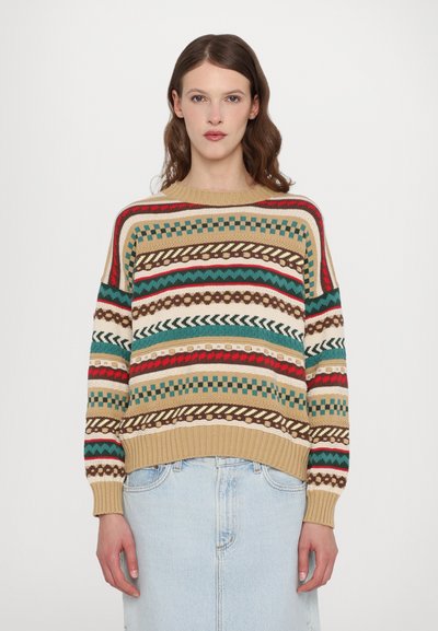 Knit sweater with multicolored geometric patterns in beige, green, red, and brown. Ribbed crew neck and cuffs; relaxed fit.