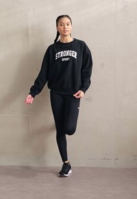 Stronger COMFY  - Pusa - black