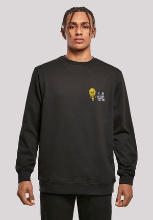 Black sweatshirt with long sleeves, round neckline; features yellow and blue cartoon character embroidery on the chest. Soft fabric texture.