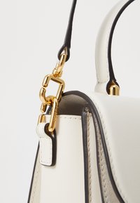 Furla SFERA mleczny