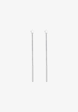 Silberne sterneförmige Ohrringe mit langen, gedrehten Metallketten und geraden Stiften. Das Design betont eine minimalistische Ästhetik.