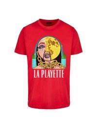 Piros pamut póló, amelyen egy arc grafikájának nyomata látható, mellette hold és láncok, az alján a "LA PLAYETTE" felirattal, élénk színekben.
