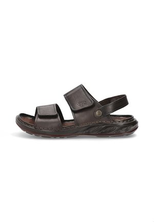 Sandalias de cuero marrón con dos correas de Velcro ajustables, plantilla texturizada y suela de goma contorneada para mayor comodidad y durabilidad.
