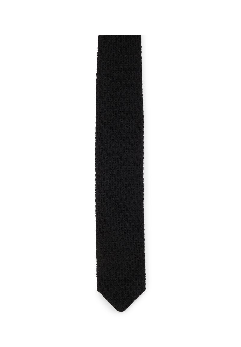 Schwarze gestrickte Krawatte mit strukturiertem Muster. Das schmale Design hat ein spitzes Ende und ist für formelle oder legere Anlässe geeignet.