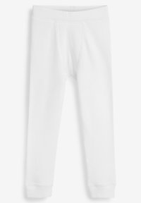 Weiße Baumwollleggings mit elastischem Bund, körpernahem Design und gerippter Textur. Bündchen an den Knöcheln für eine enge Passform.