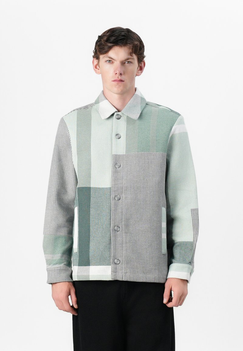 Holzweiler Lichte jas groen Holzweiler Lichte jas groen