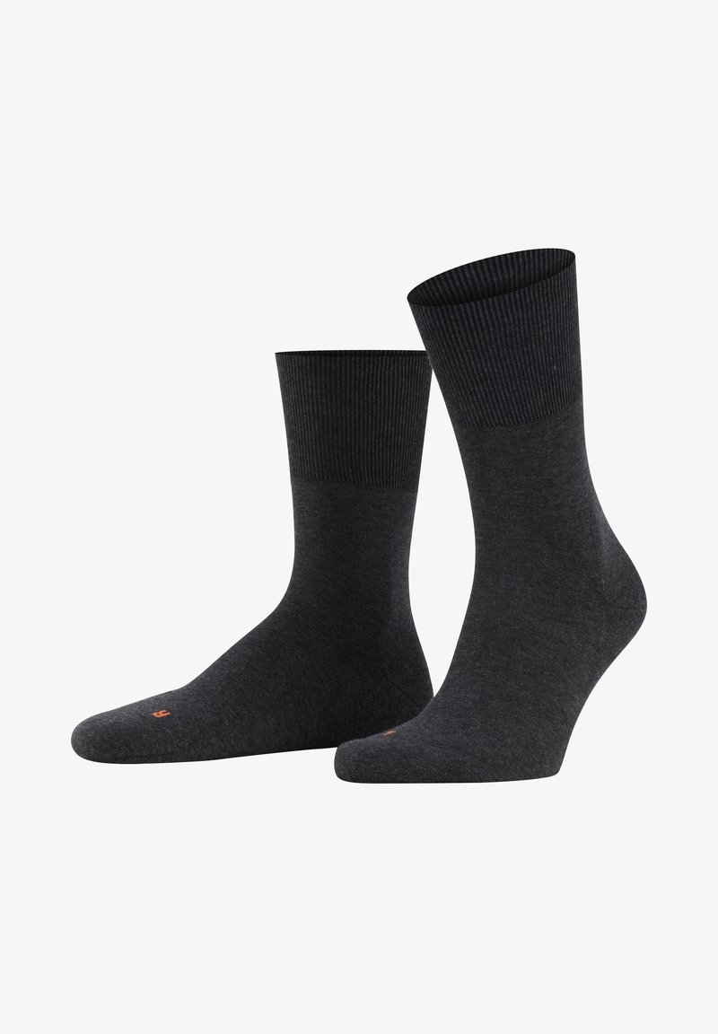 Pair of dark gray crew socks with ribbed cuffs and small red markings on the toes, displayed on white background.