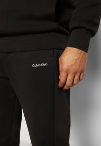 Calvin Klein MICRO LOGO JOGGER - Træningsbukser - black