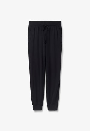 Sorte joggerbukser med elastisk talje, snøre, sidelommer og ribkanter ved anklerne, lagt fladt på en hvid baggrund.