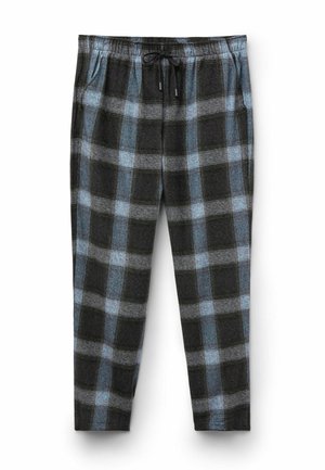 Black and blue plaid pajama pants with an elastic waistband, drawstring closure, and side pockets; soft fabric with a cozy texture.