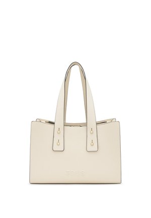Beżowa prostokątna torba na ramię z podwójnymi uchwytami, minimalistycznym przeszyciem i wytłoczonym logo "TOUS" na środku przedniej strony.