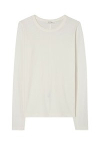 Långärmad skjorta i off-white, gjord av mjukt tyg. Rund halsringning med minimala sömmar, har en avslappnad passform och lätt tygkvalitet.