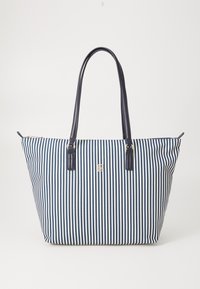 Sac fourre-tout rayé en bleu marine et blanc, avec une fermeture éclair, deux poignées en cuir et un détail logo doré à l'avant.